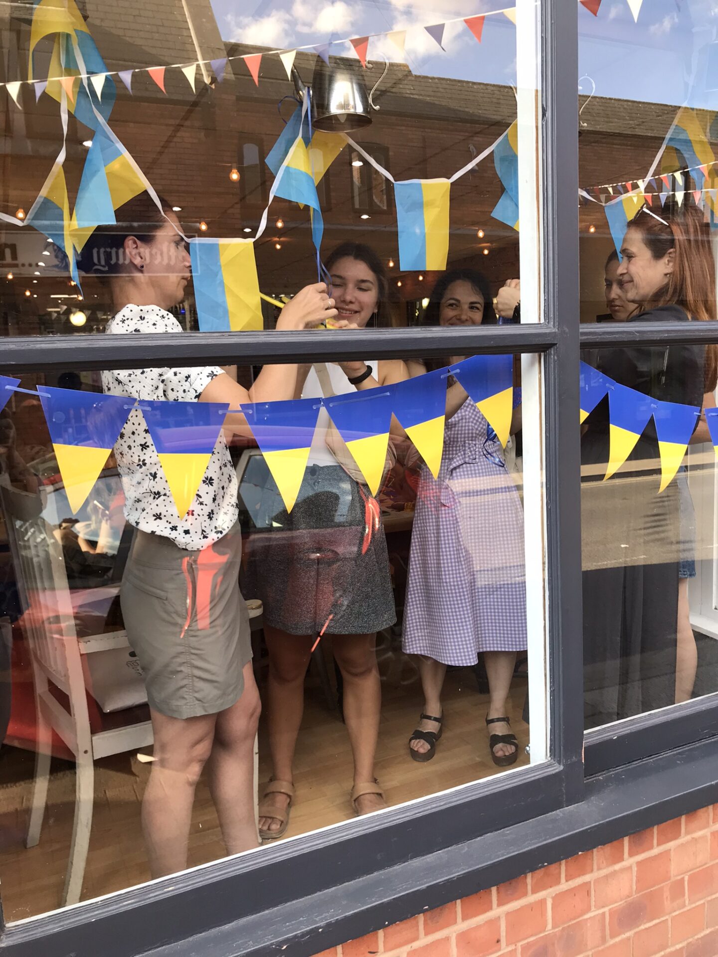 Decorating cafe in Ukranian  colours for opening Ceremony in Lutterworth
