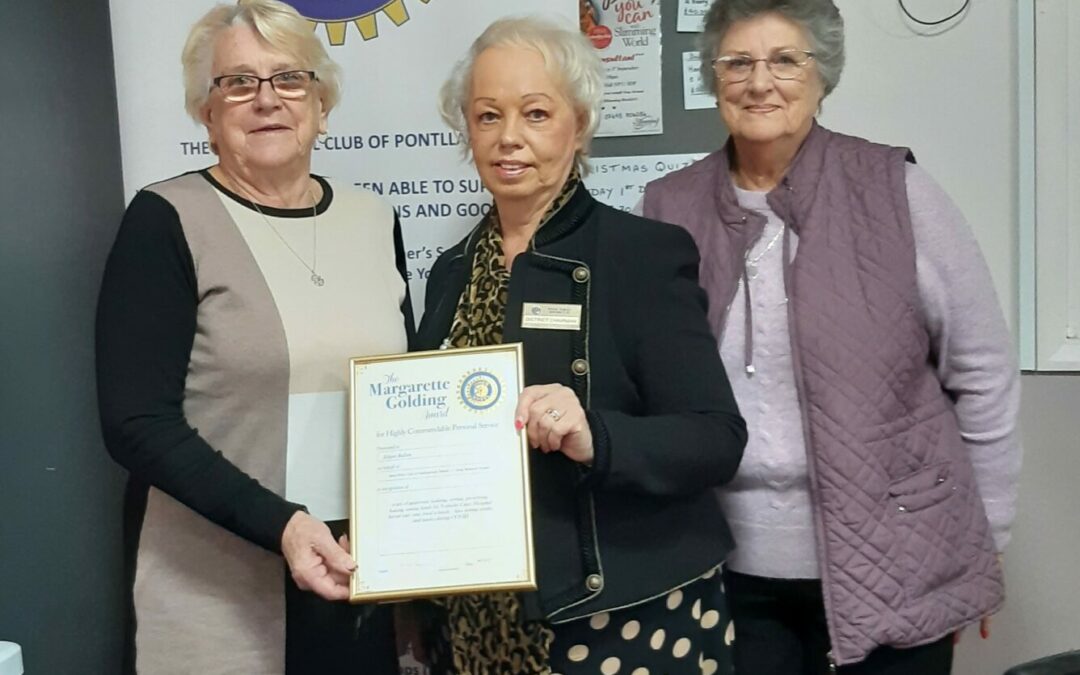 Eileen receives her Margarette Golding award