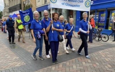 D10 Gloucester Inner Wheel parading through Gloucester