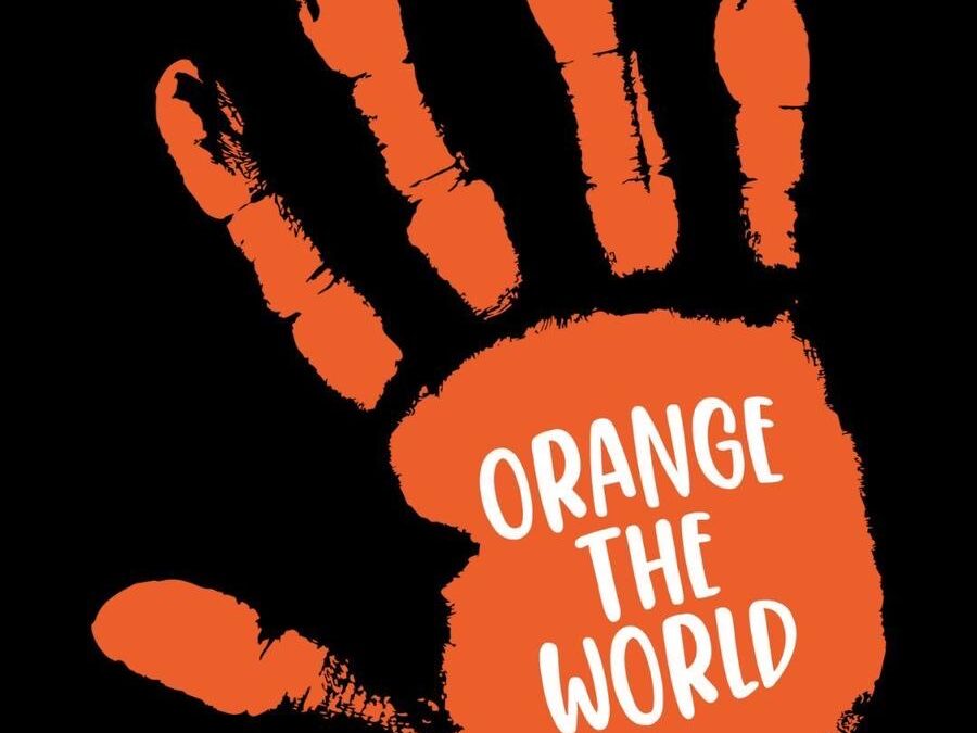 D128 – Leigh support Orange The World