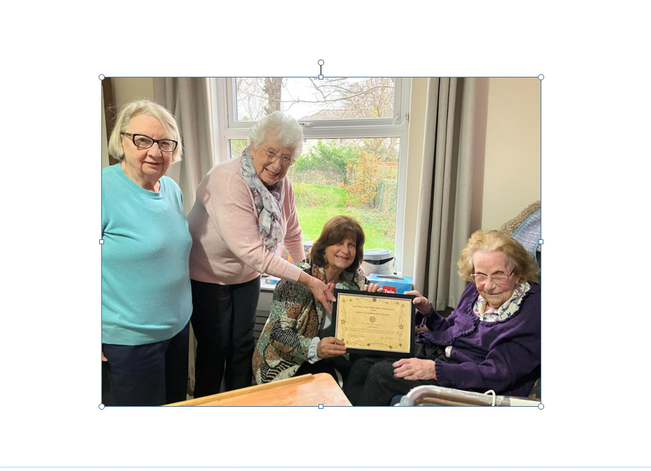 Torquay’s oldest member, at 104 years young, receiving her ‘Golden Girl Certificate’ December 2024